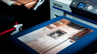 t-shirt getting digitally printed with a printer