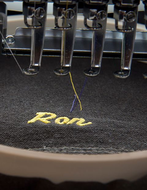 close up of custom embroidery in jersey apparel