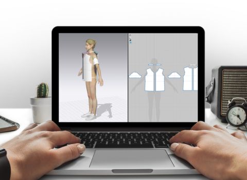 Digital clothing visualization on laptop — designer adjusting 3D garment sample before production approval.