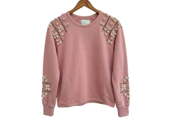 dusty rose crewneck with hand shell work on the shoulders and sleeves manufactured by zeddwork studio